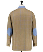 Veste en laine. Tweed beige à carreau ciel